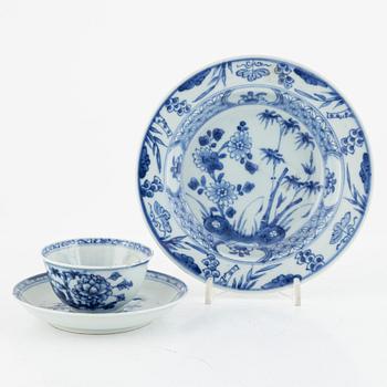 A blue and white porcelain dish, cup and saucer, China, Qing dynasty, 18th century.