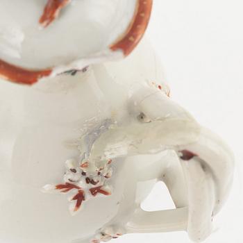 A blue and white moon flask and two creamers, porcelain, China, 18th-19th century.