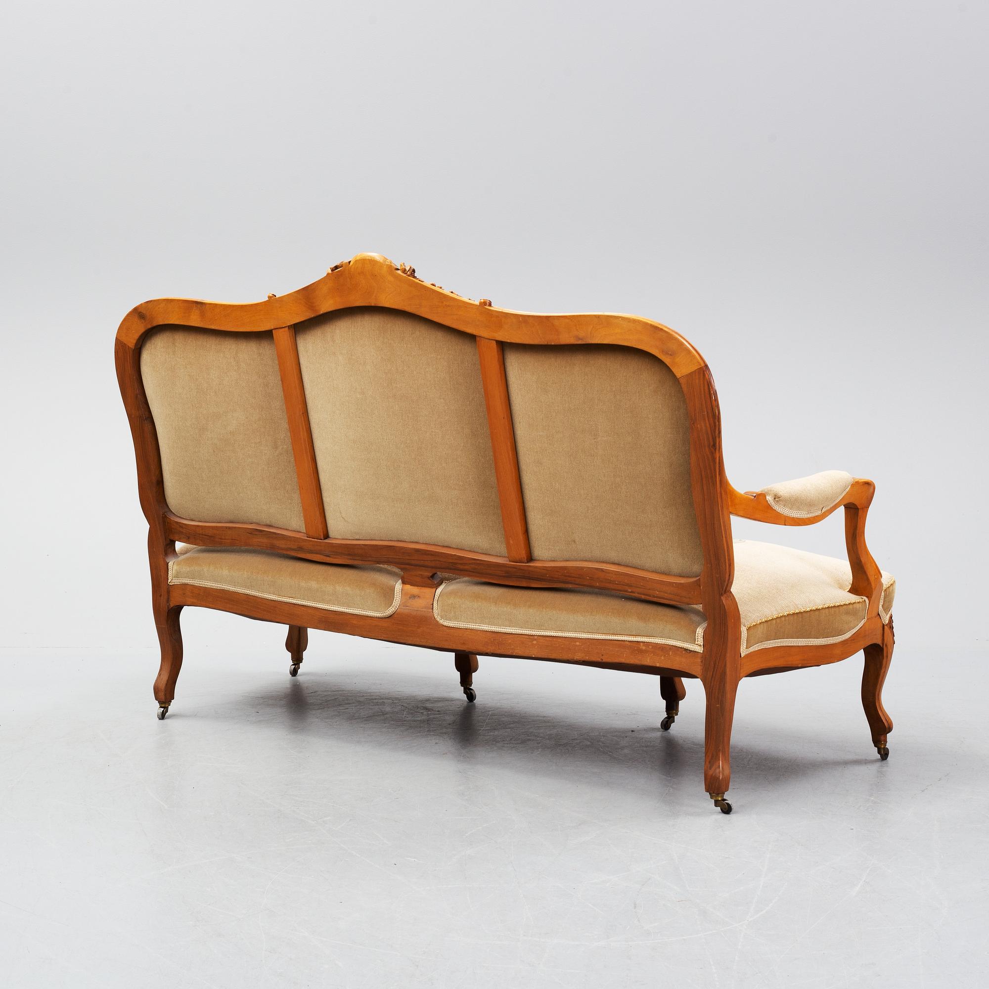 A set of sofa, two armchairs and six chairs, Louis XV-style, ca 1900.