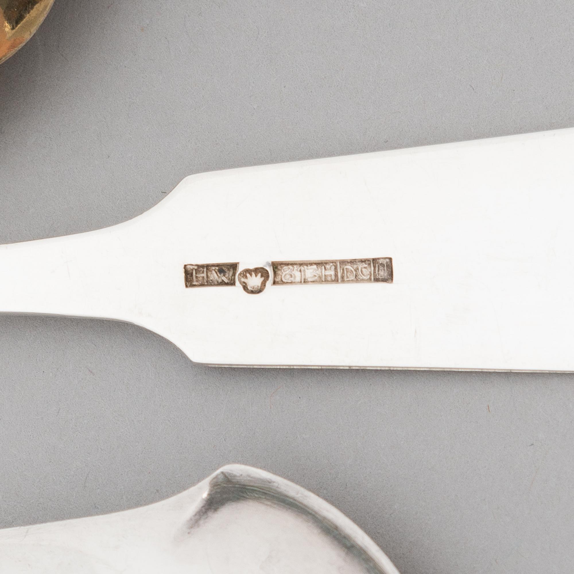 A 52-piece set of silver cutlery with seashell decoration, Finnish hallmarks 1922-1949.