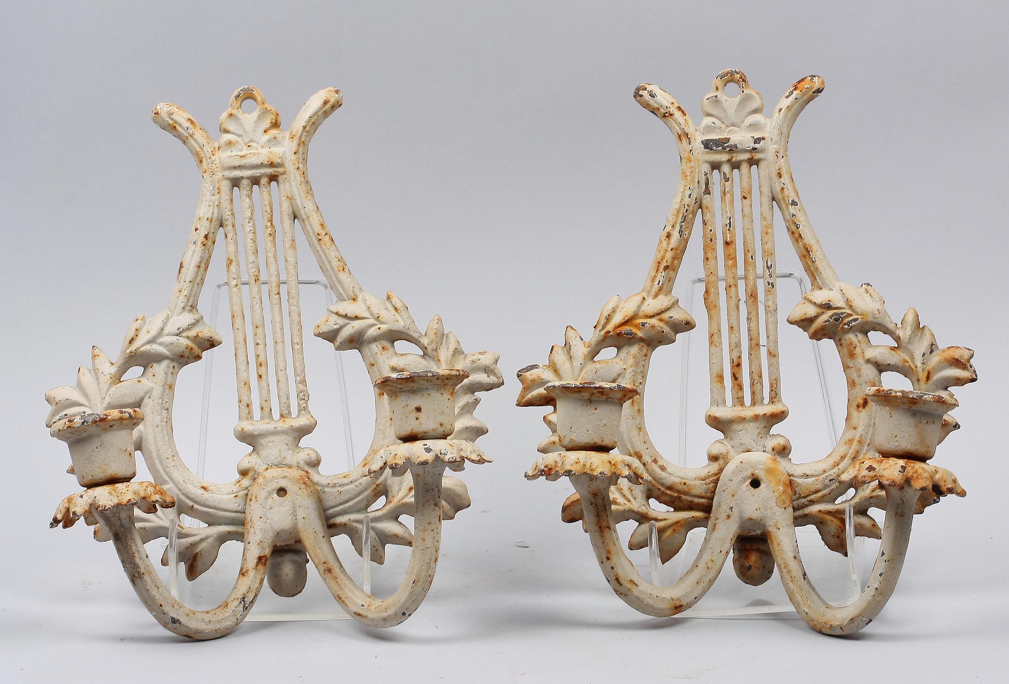 APPLIQUER, ett par, gjutjärn, 1900/2000-tal.