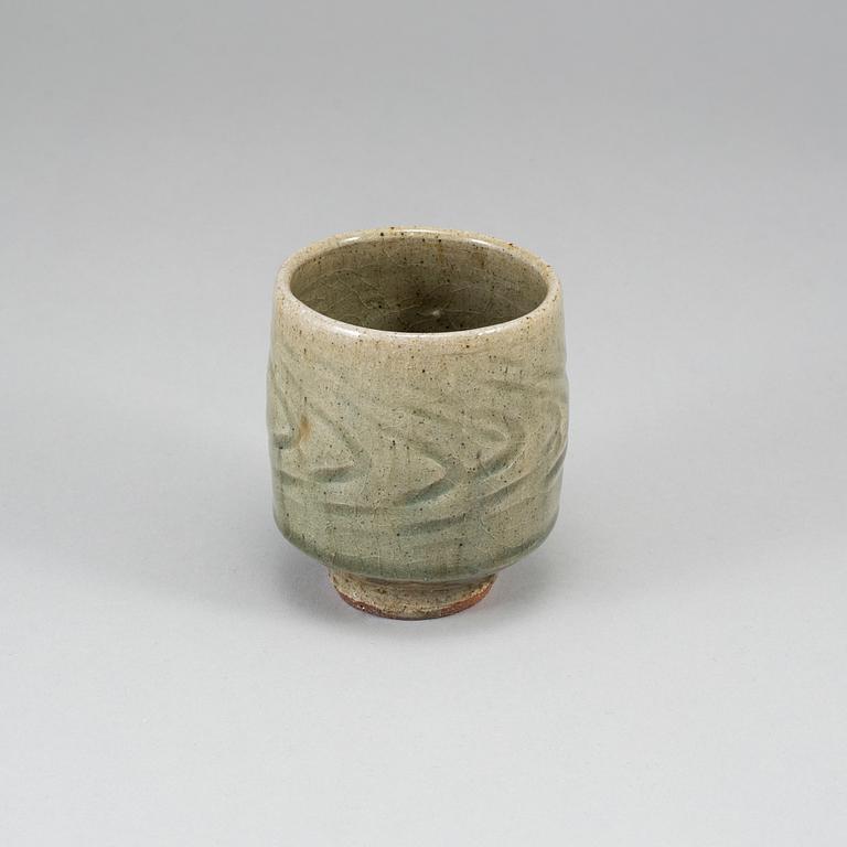 TATSUZŌ SHIMAOKA, a celadon glaze vase, signed.