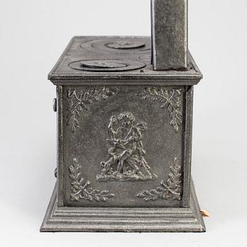 DOCKSPIS MED TILLBEHÖR, gjutjärn, 1900-talets början.