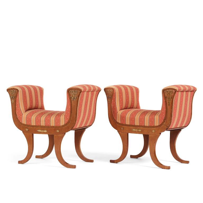 A pair of Swedish Royal Empire stools.