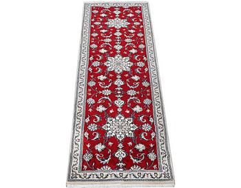 A Nain runner carpet, part silk, c. 300 x 78 cm.