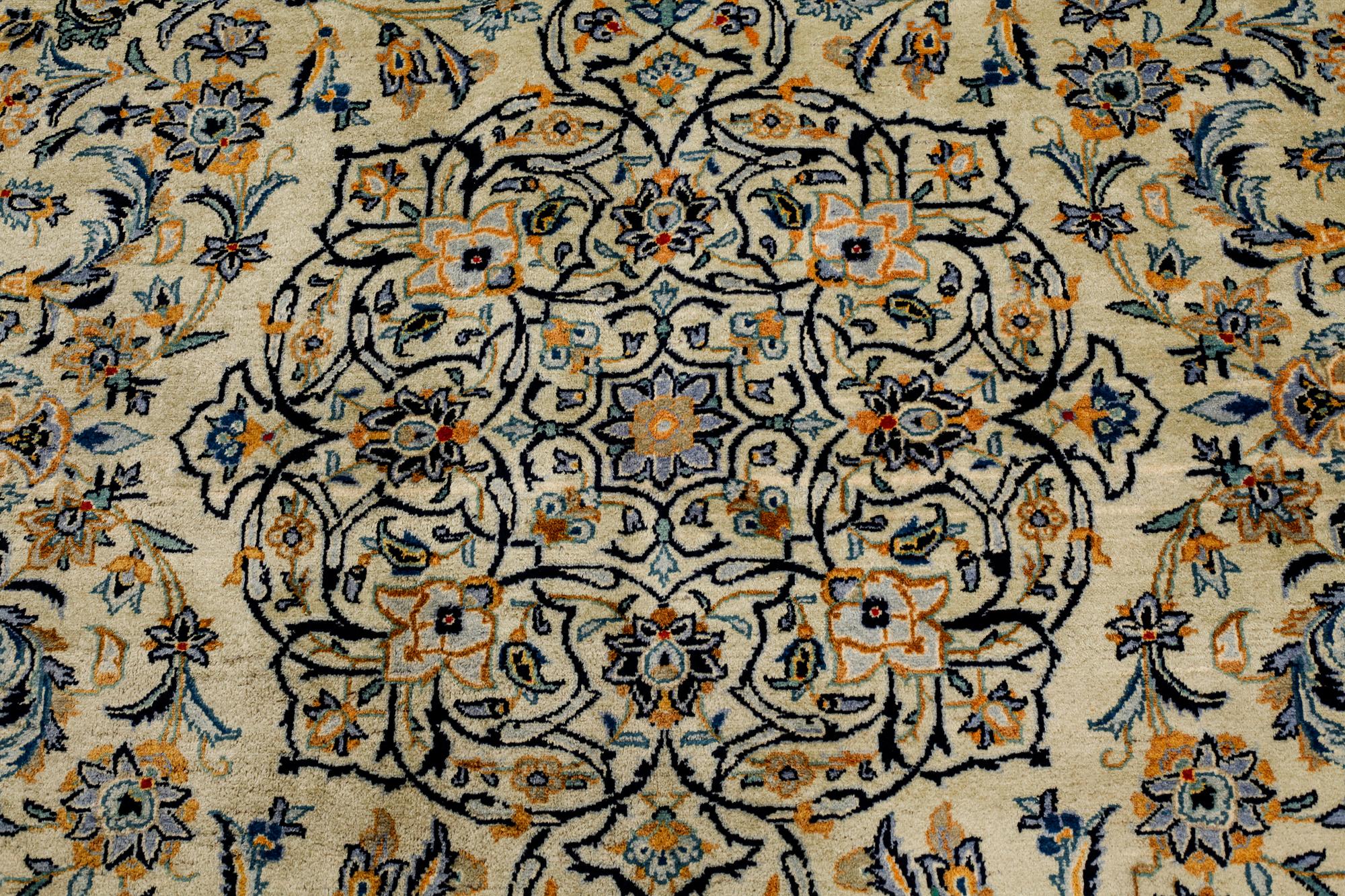 A Keshan rug, signed, ca 370 x 268 cm.