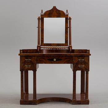 A  mahogany empire dressing 19th century table with mirror.
