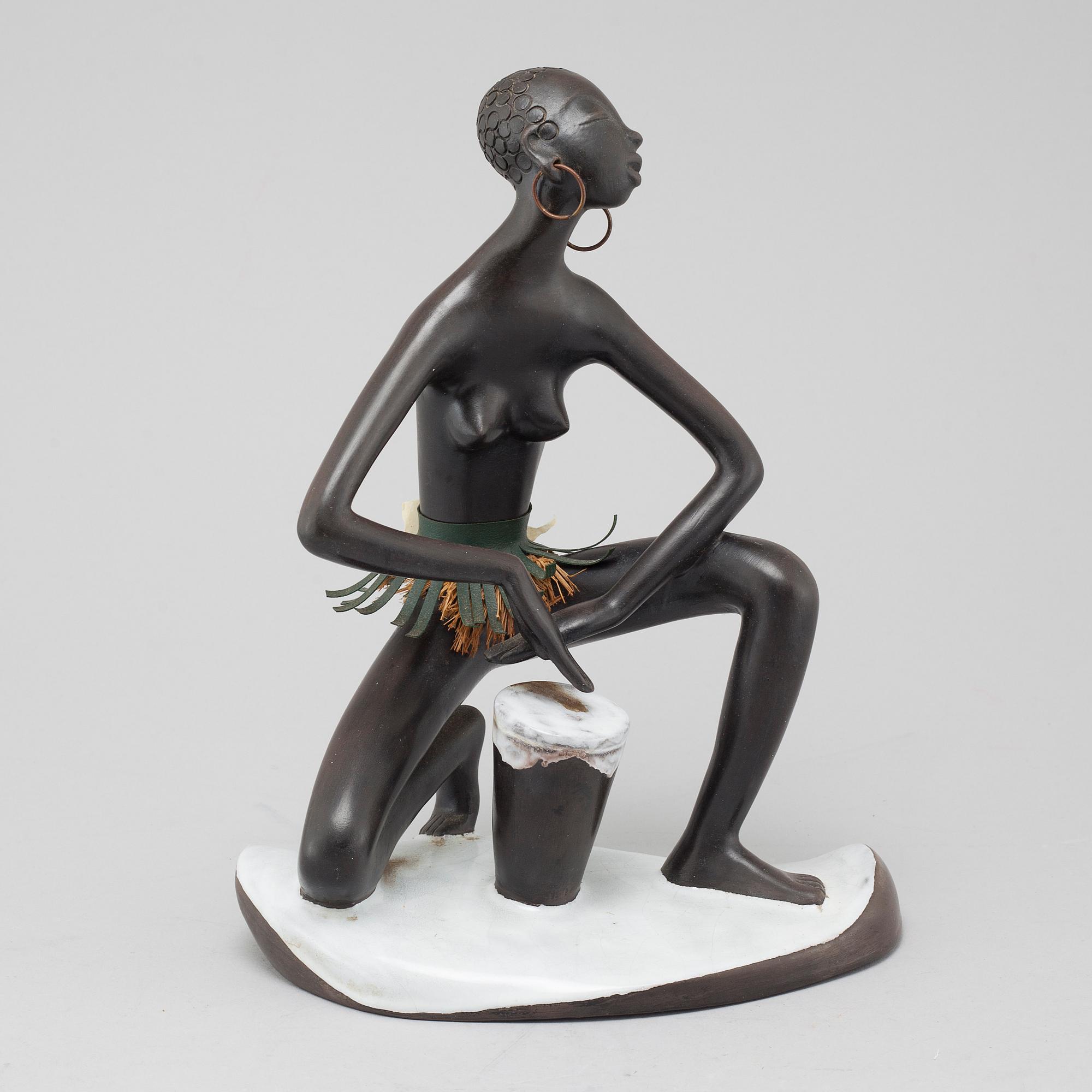 A stoneware figurine from Anzengruber in Austria, around the mid 20th century.