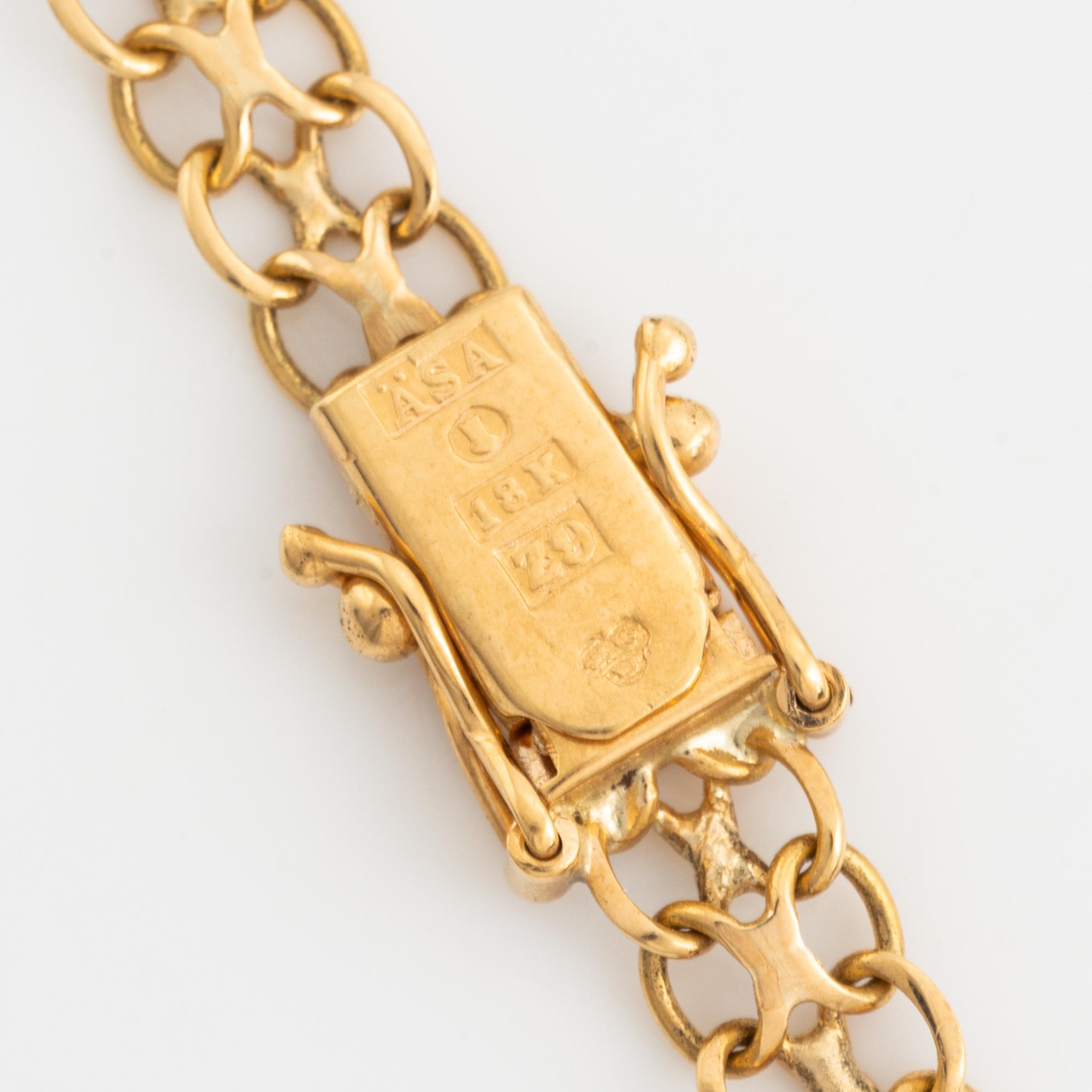 Armlänk, 18K guld, x-länk.