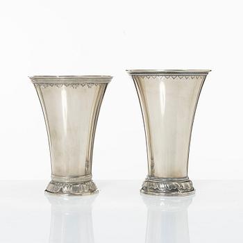 Two Swedish silver beakers, marks of GAB, Stockholm 1896 and of CG Hallberg, Stockholm 1930.