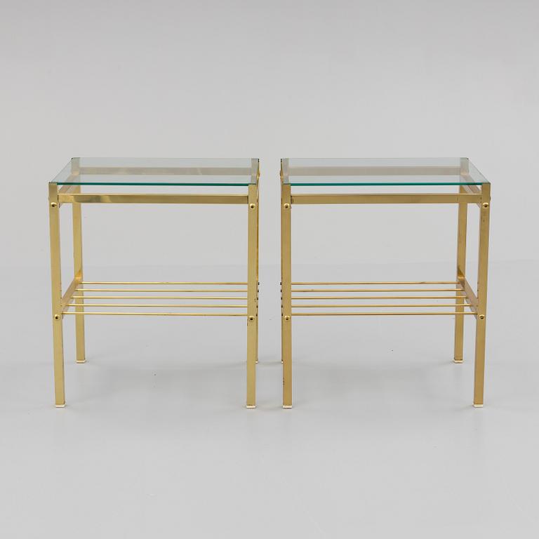 A pair of brass and glass tables, second half of the 20th century.