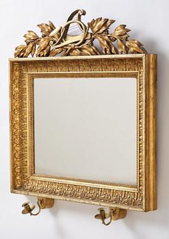 A two-branch Empire giltwood girandole mirror by P. G. Bylander (master in Gothenburg 1811-58).