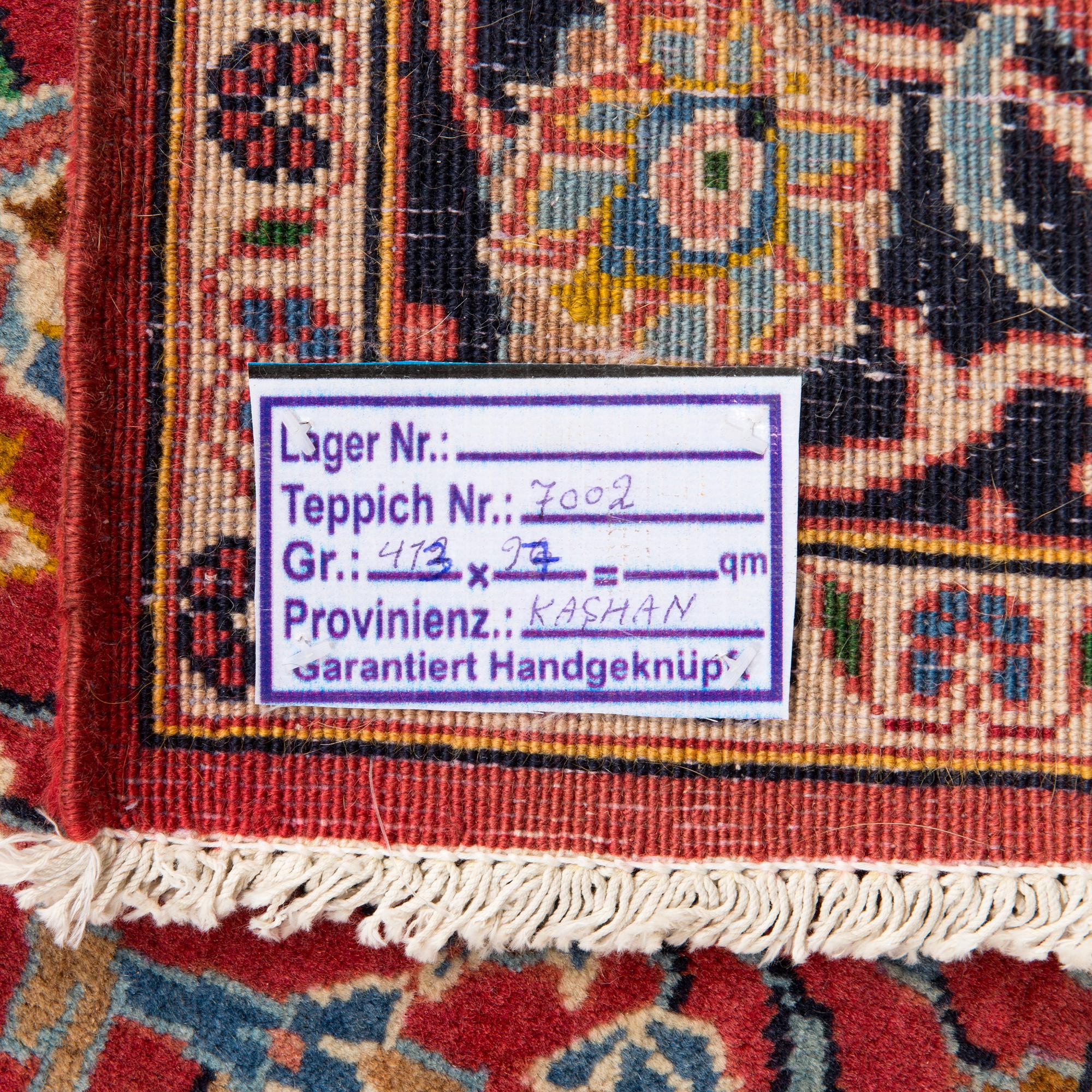 An oriental runner. Circa 413x97 cm.