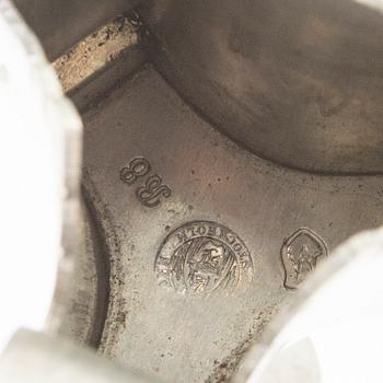 Firma Svenskt Tenn,  a pair of 1928 pewter candle sticks.
