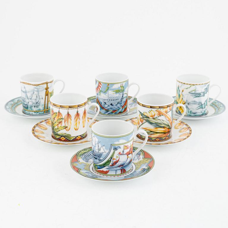 Hermès, 6 porcelain coffee cups with saucers, France, 20th century.