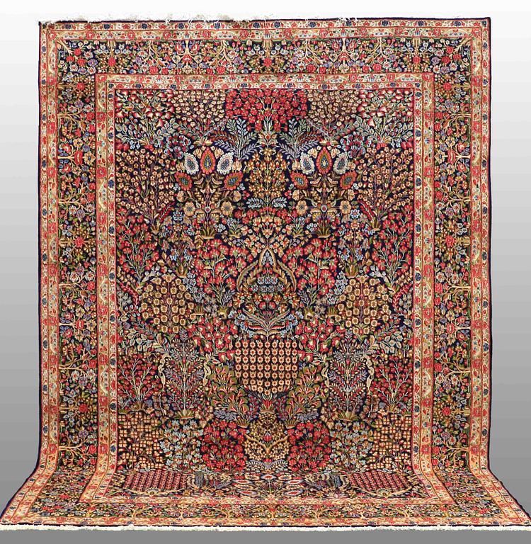 A carpet, Kerman, around  408 x 300 cm.