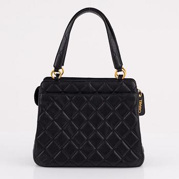 Chanel, a black caviar leather bag, 1997-1999.