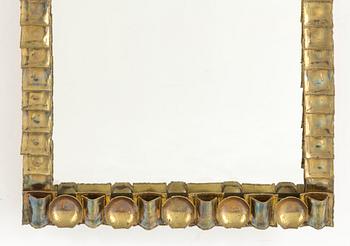 CLAËS E. GIERTTA, a brass mirror, 1970/80's.