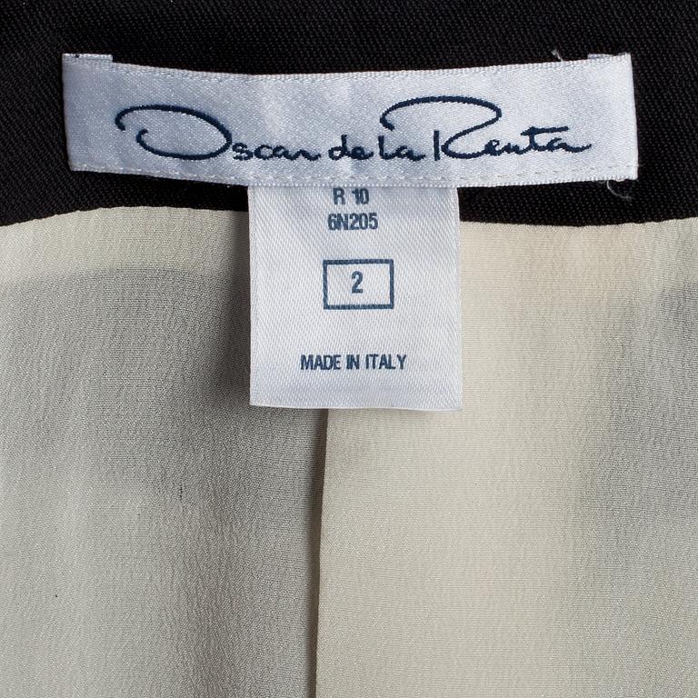 OSCAR DE LA RENTA, a bouclé cotton blend jacket.