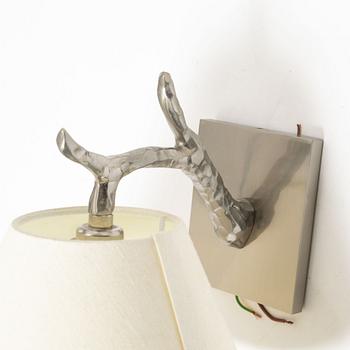 A pair of 'Twig Down' wall lamps, Vaughan, United Kingdom.