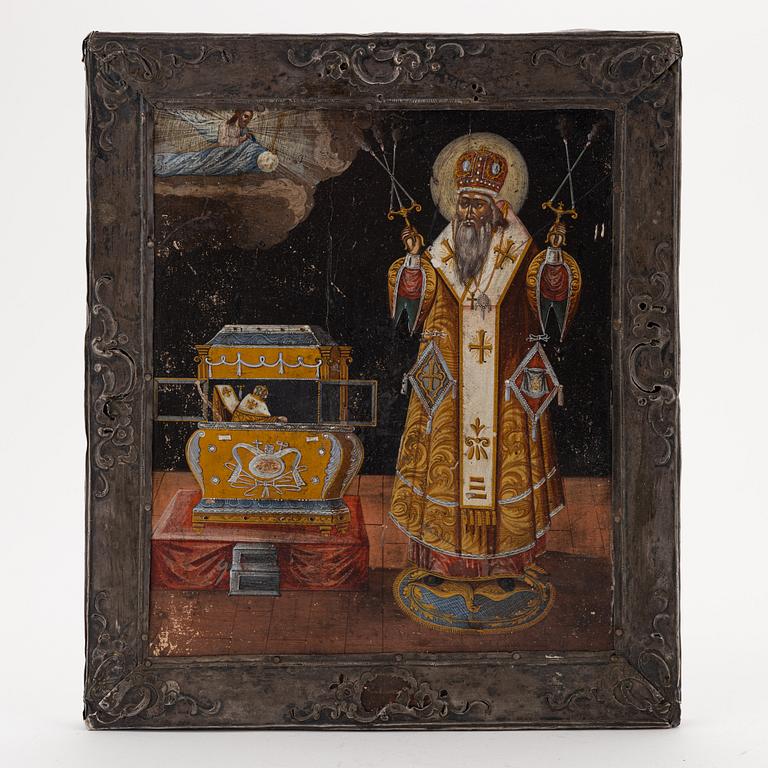 A silver and tempera on wood icon, Moscow 1776.