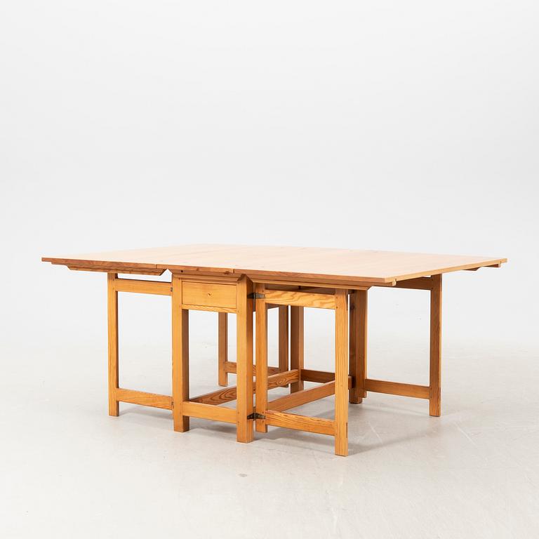A mid 20th century/second part pine folding table.