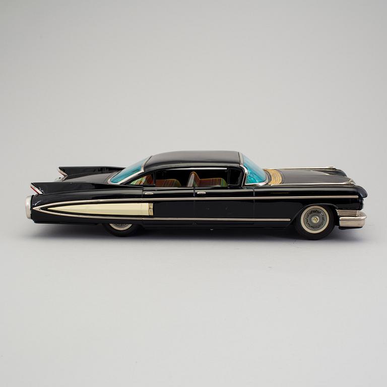 A tinplate Cadillac by Yonezwa, Japan. Ca 1960.