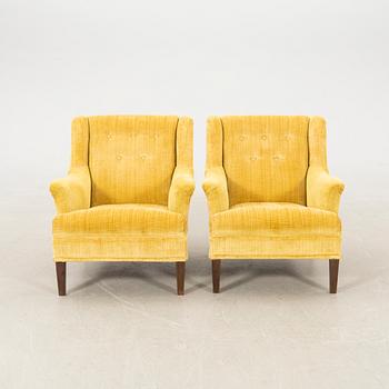 Armchairs a pair of "Cosy" Nordiska Kompaniet (NK) later part of the 20th century.