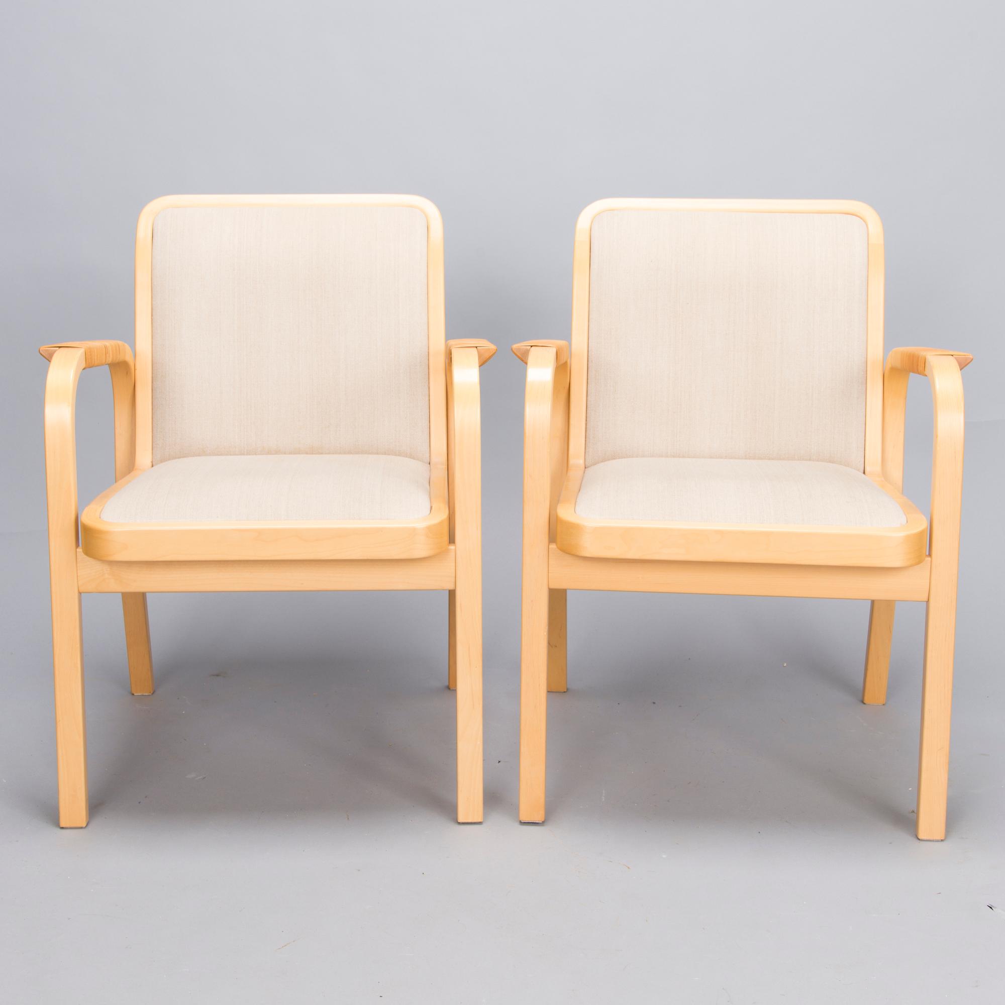 ALVAR AALTO, Pair of model 'E45' armchairs for Artek, late 20th Century.