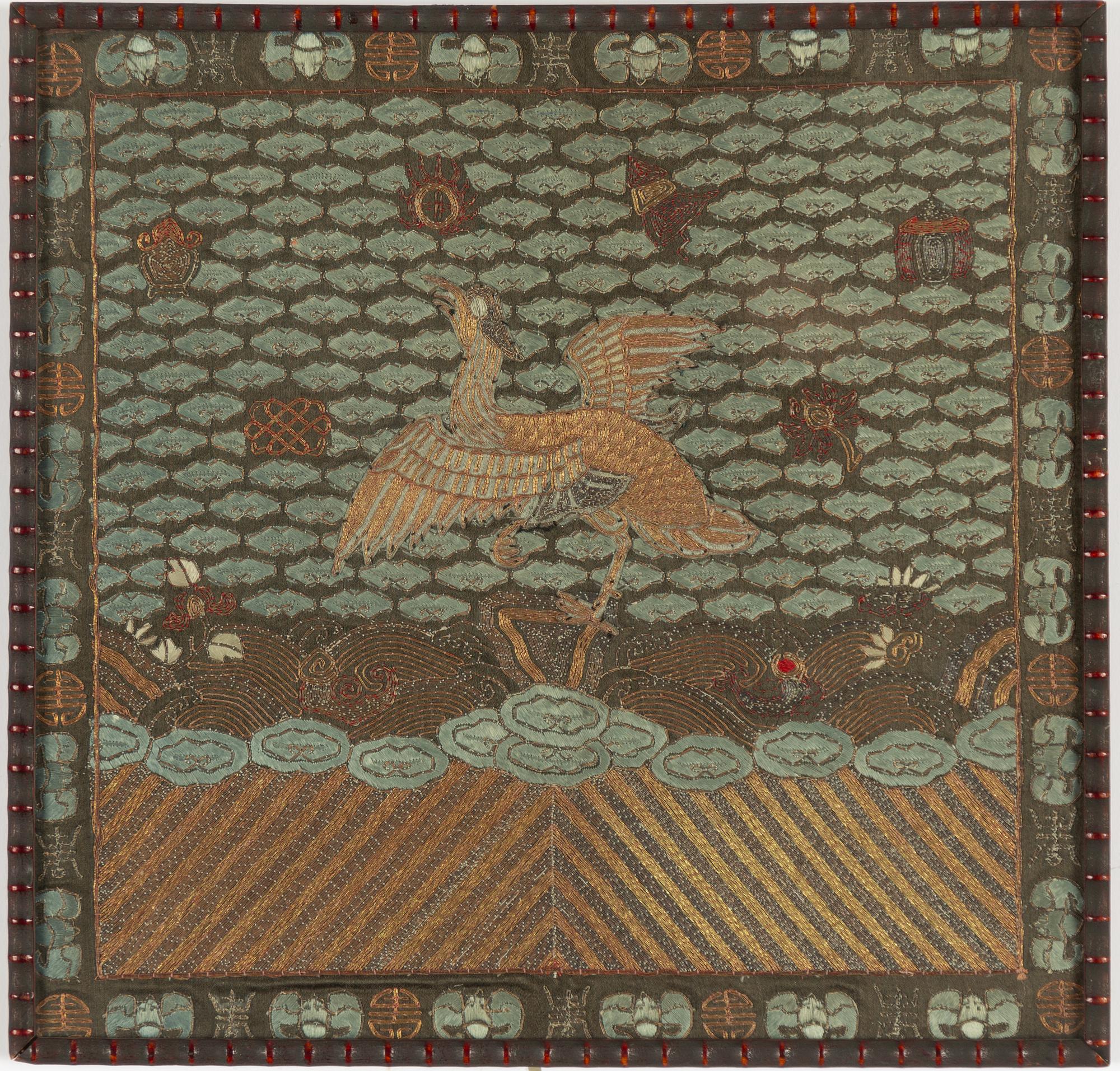 An embroidered civil official's rank badge with a bird, 'buzi', Qing dynasty.