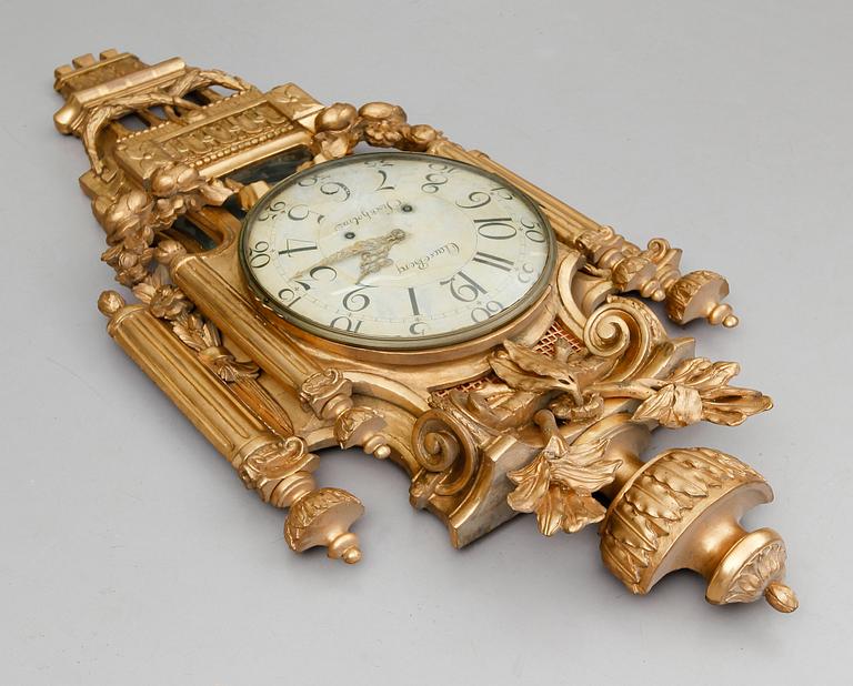 A Gustavian wall clock by Claes Berg, master 1762.