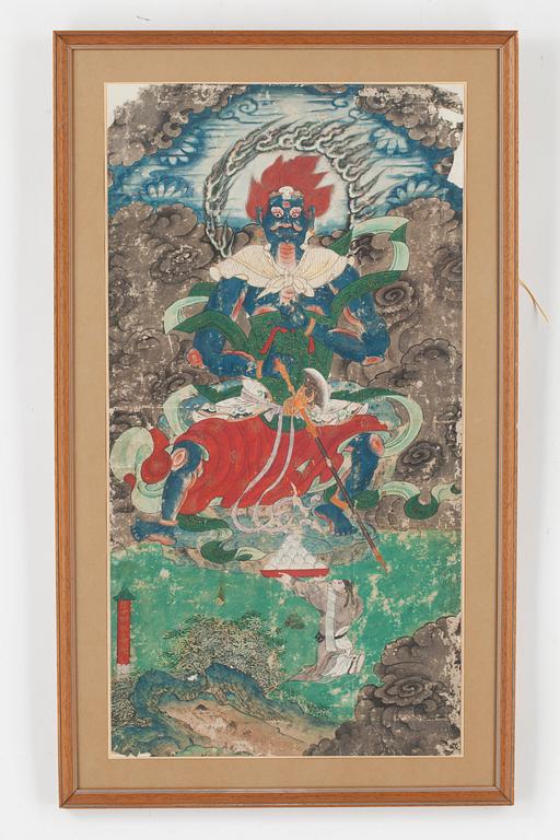 A painting of a wrathful deity with Buddhist devotee, Qing dynasty, presumably 18th Century.