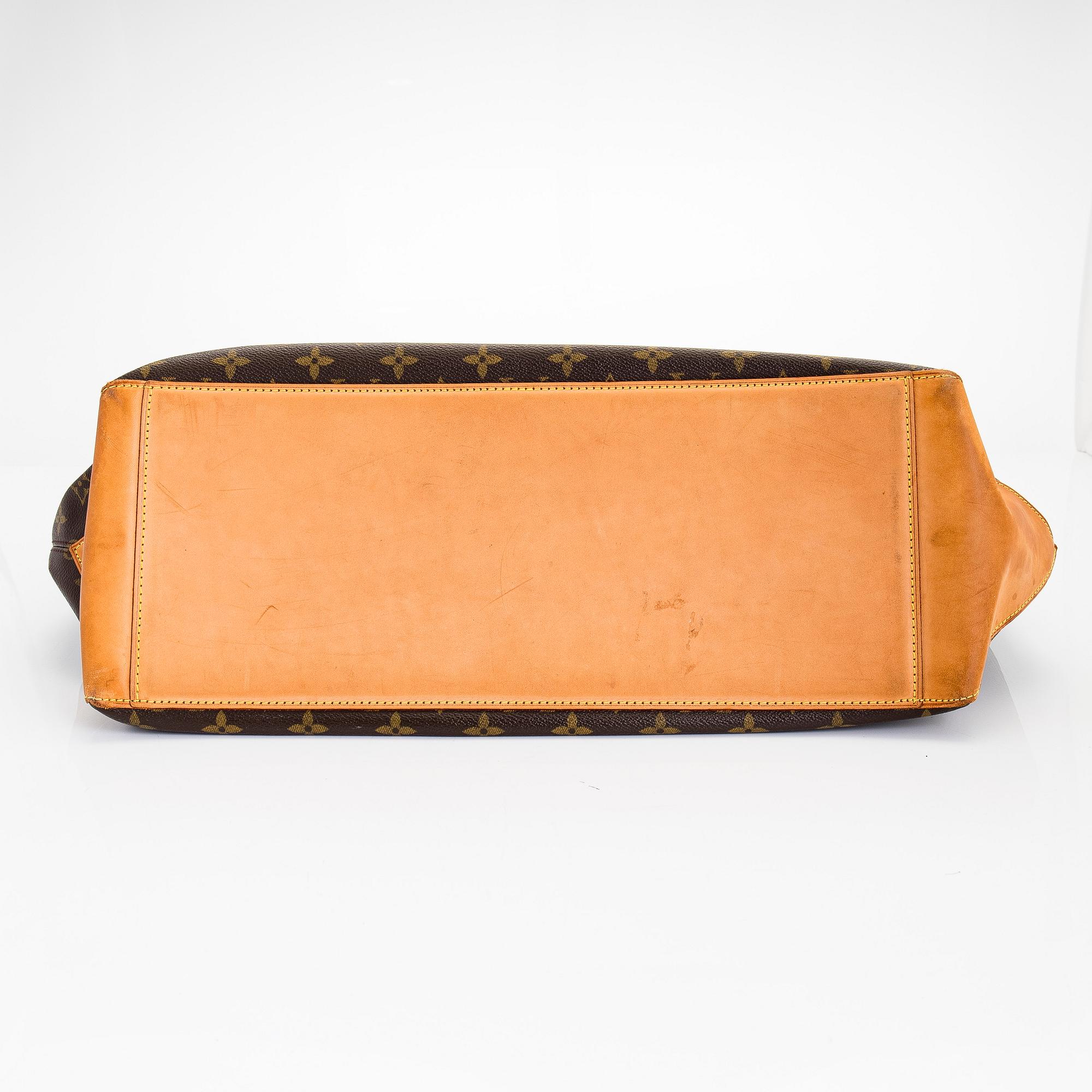 Louis Vuitton, a 'Cabas Alto' tote bag.