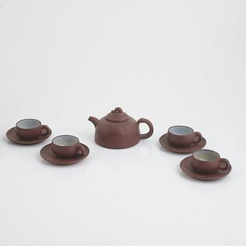 A collection of Yixing tea pots and tea cups, China, second half of the 20th century.