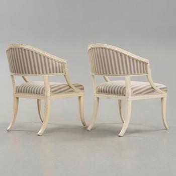 A pair of late Gustavian armchairs in the manner of Ephraim Ståhl, master in Stockholm 1794-1820.