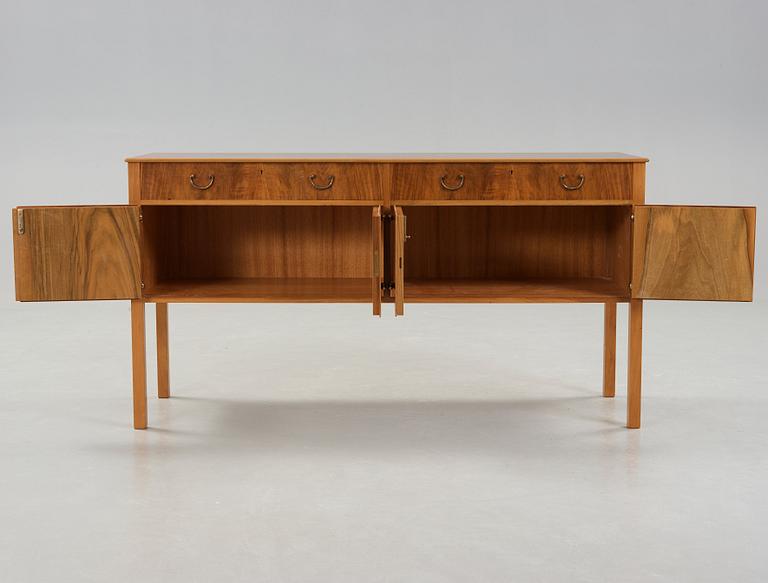 Josef Frank, A Josef Frank walnut and burrwood sideboard, Svenskt Tenn, before 1985.