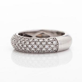 A 14K white gold ring with diamonds.