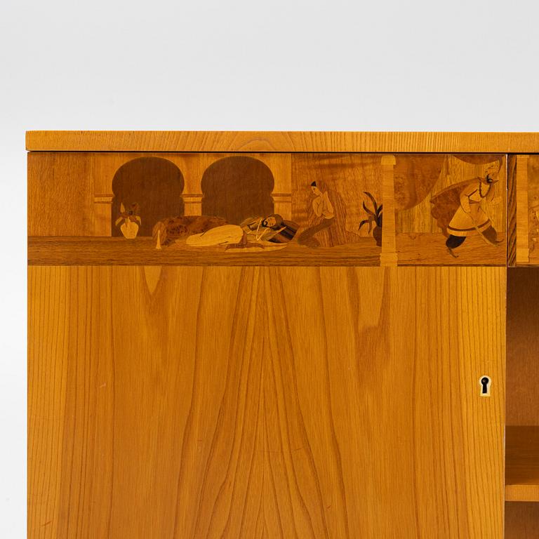 Bokhylla, "Tusen och en natt”, troligen Mjölby Intarsia, 1930-tal.