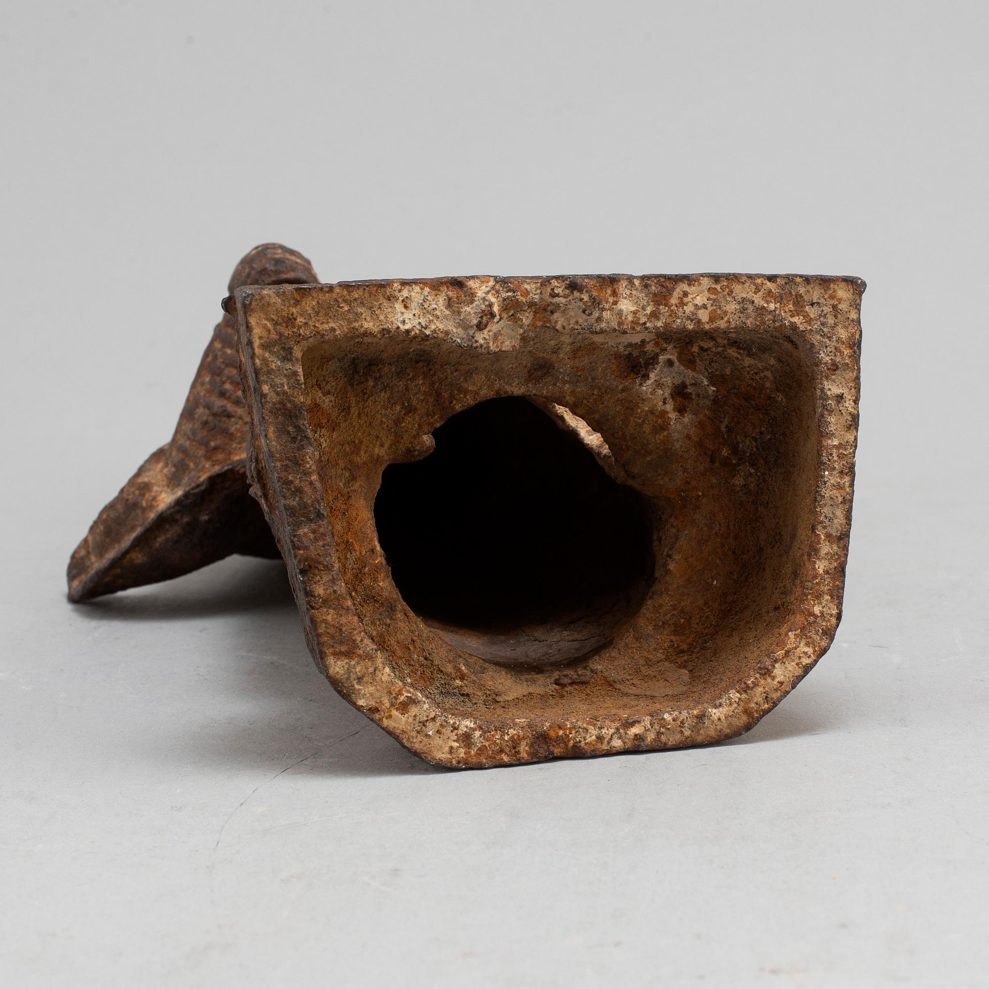 A cast sculpture of a gurads man, presumably Ming dynasty.