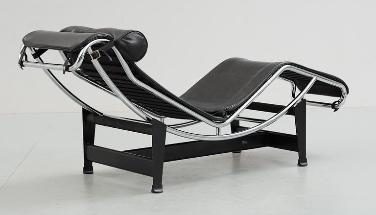 A Le Corbusier 'LC 4' black leather and chromed steel reclining chair, Cassina, Italy.