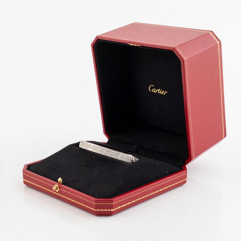 A Cartier "Love" bracelet in 18K white gold set with round brilliant-cut diamonds.