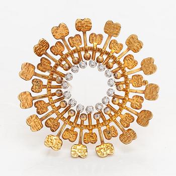 Tapio Wirkkala, "Sun", an 18K gold brooch with diamonds ca 0.13 ct in total. Kultakeskus, Hämeenlinna 2000.