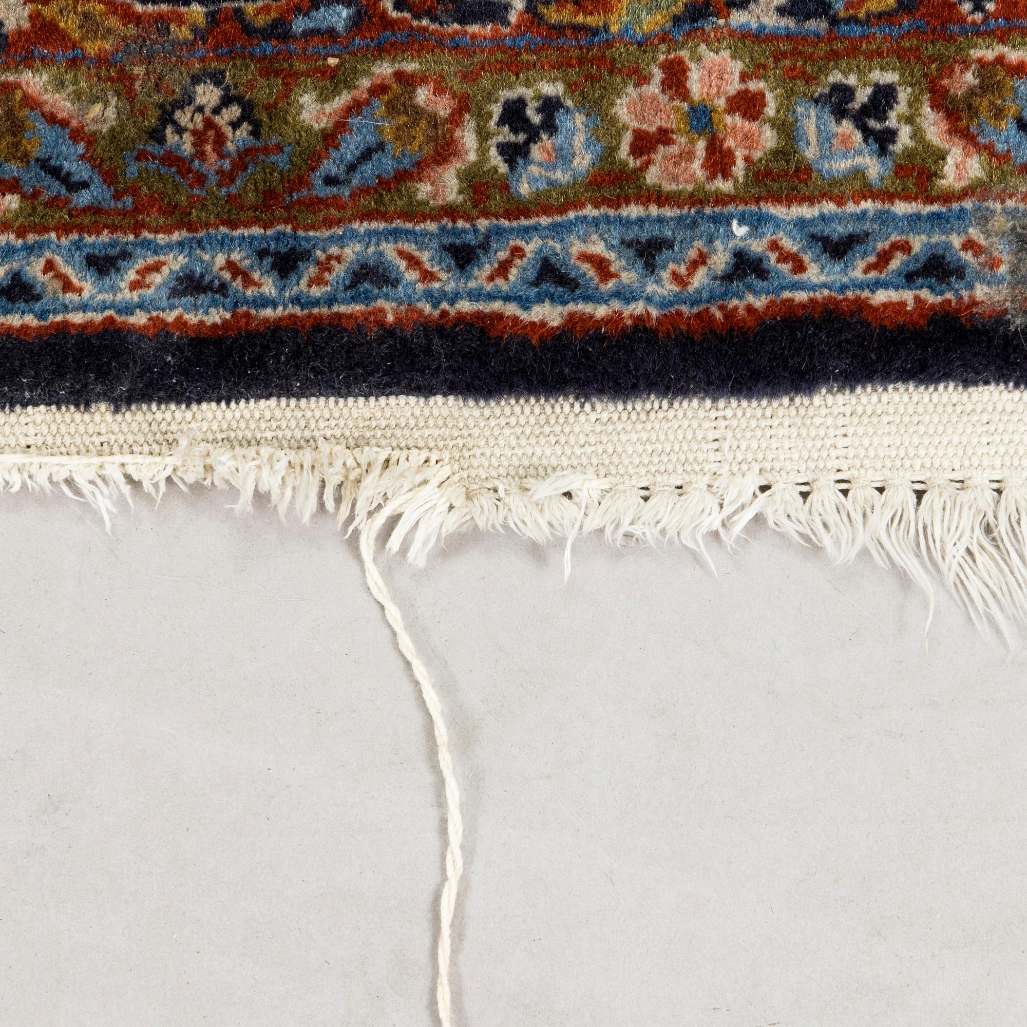 A Moud rug, eastern Iran, signed, approx. 151 x 230 cm.