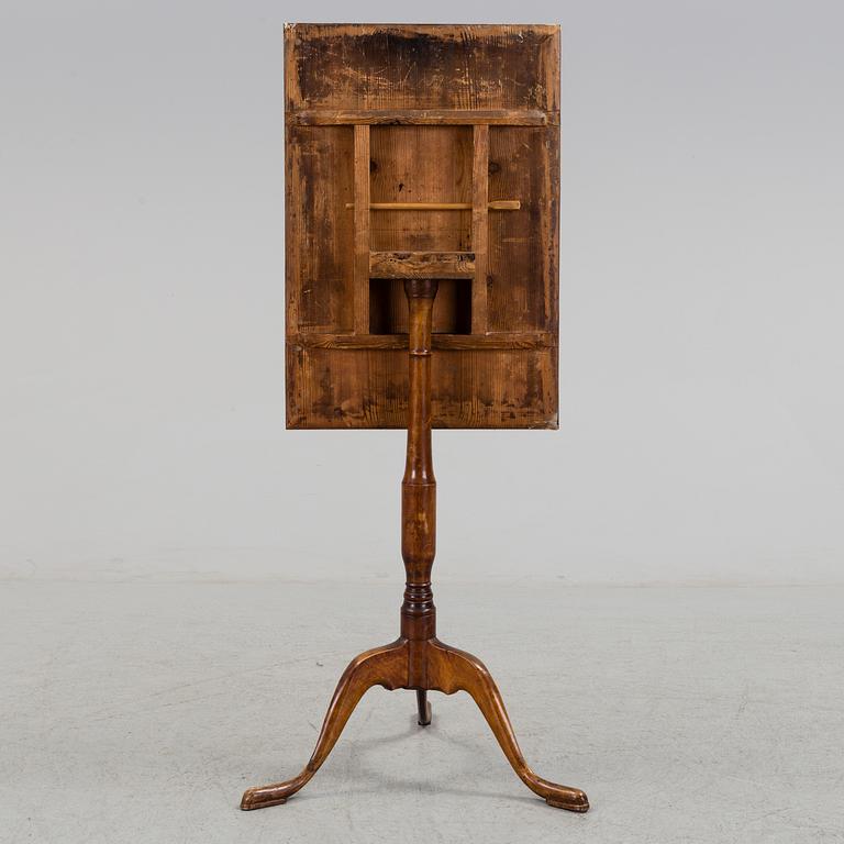 An early 19th century folding table.