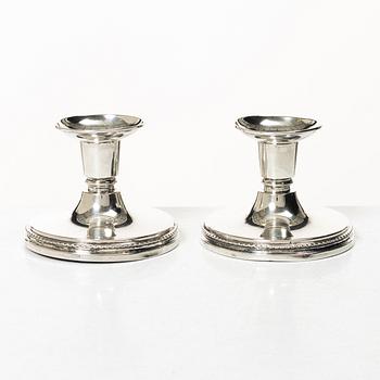 A pair of silver candlesticks, MGAB, Uppsala, 1966.