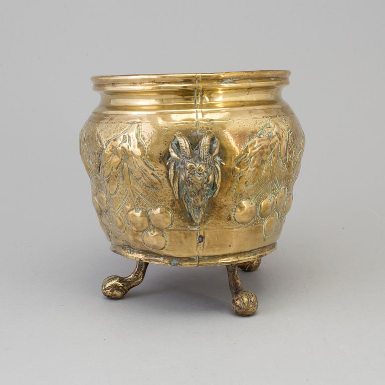 A 19TH CENTURY BRASS FLOWER POT.