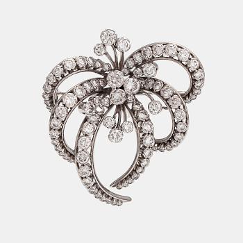 A Tillander, An 18K white gold brooch with diamonds ca. 9.50 ct according to certificate.