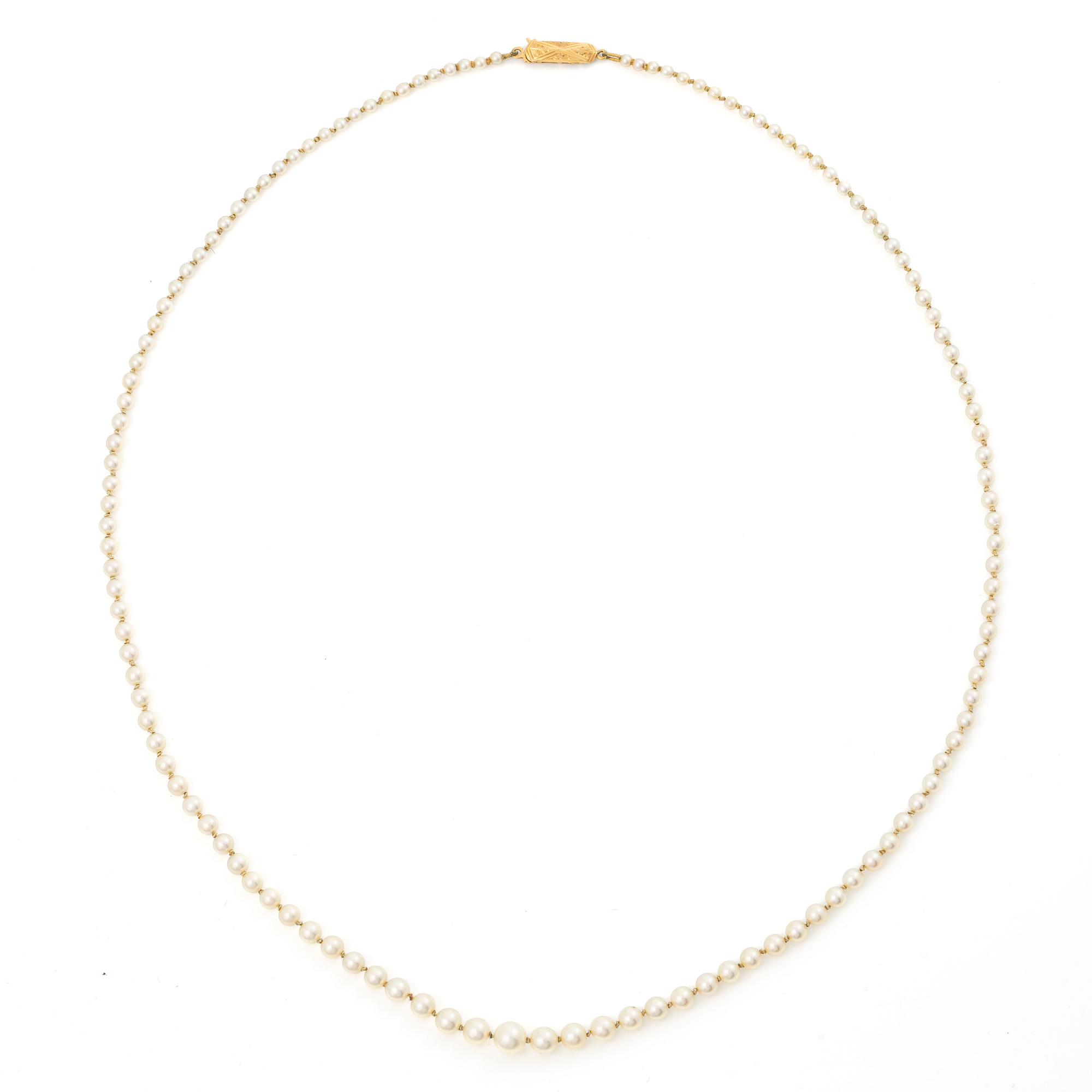 Collier odlade pärlor lås 18K guld.