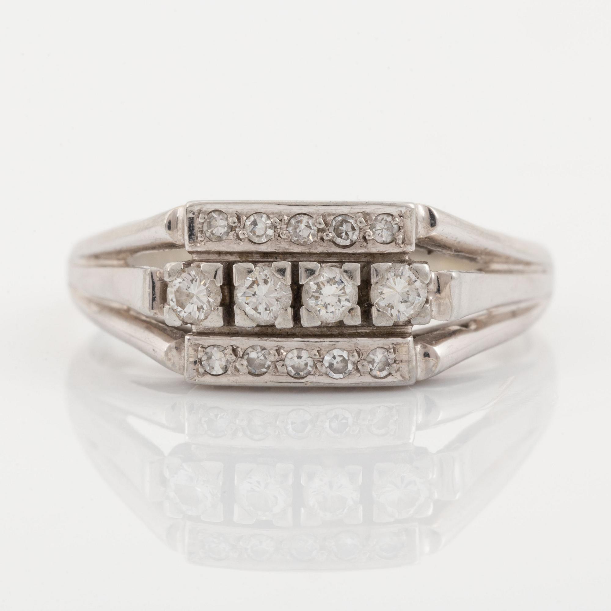 18K gold ring with diamonds.