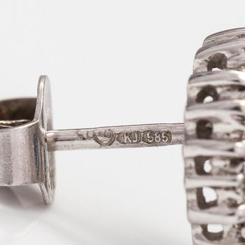 A pair of 14K white gold earrings with sapphires and diamonds ca 0.05 ct in total.